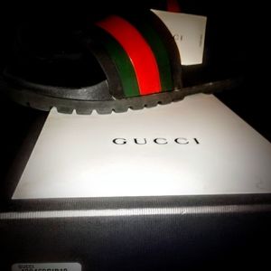 Gucci slides.  Brand new. Size 12. Excellent condition. Asking 125 obo.